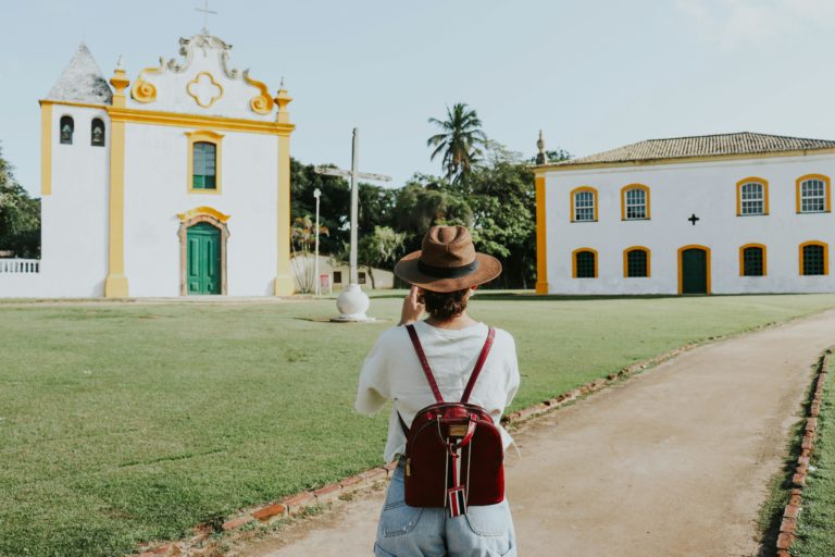 A tourist pictured taking pictures of a cultural site